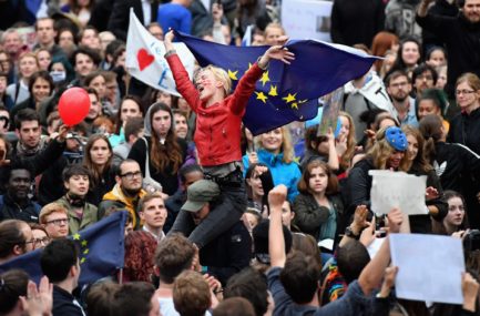 LONDON, ENGLAND - JUNE 28: Protesters hold up signs and flags as they demonstrate against the EU referendum result outside the Houses of Parliament on June 28, 2016 in London, England. Up to 50,000 people were expected before the event was cancelled due to safety concerns. In the early evening a crowd still convereged on the square to vent their anti-Brexit feelings, before the protest moved to the Houses of Parliament. (Photo by Jeff J Mitchell/Getty Images)